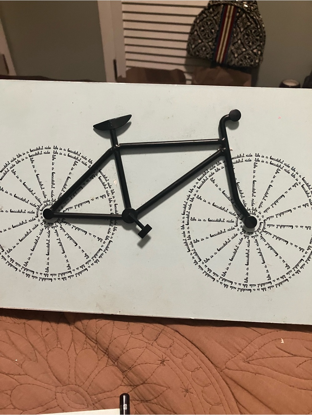 Black Metal Wall Art With a Minimalist Bicycle Silhouette